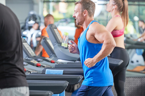 PureGym man on treadmill machine